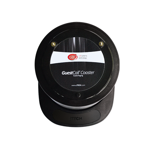 The top of a coaster pager charging rack, displaying one coaster pager with the words "JTECH", GuestCall Coaster" and "Guest Paging"