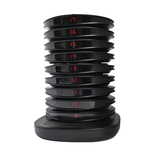 The side view of a JTECH coaster pager charging rack displaying a variety of numbers.