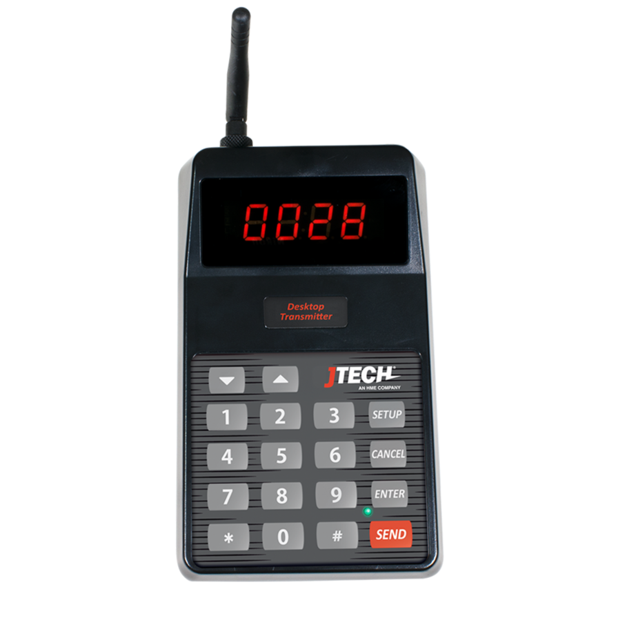 A black desktop transmitter with a keyboard and a digital display.