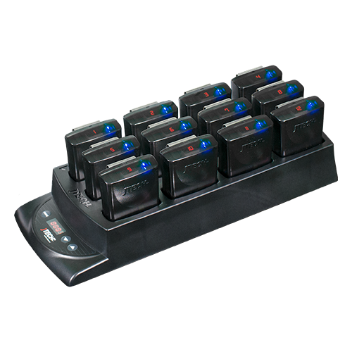 A black rugged pager charging station with multiple charging slots, each holding a pager with a blue indicator light.