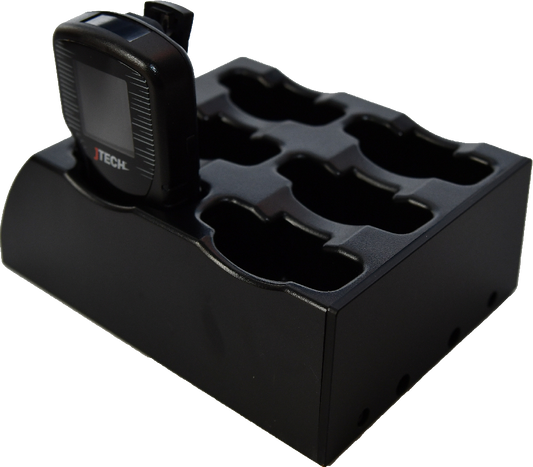 A black 6-way charging rack for SmartCall Alert pagers with a JTECH brand on the top right corner.