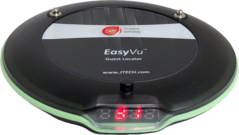 The side view of a black EasyVu guest locator device with a white label in the center that has red and green text and a website address at the bottom. There is also a digital display showing a red number.