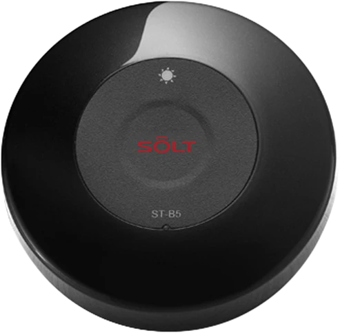 A black SOLT SB5 call button transmitter with a classic round design featuring the brand's logo in red text.
